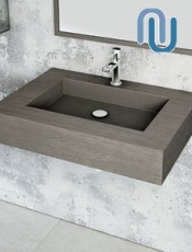 Encimera con seno y faldón integrada para baño, diseño moderno y funcional en materiales resistentes.